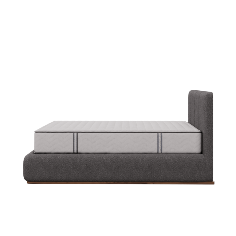 Side view of a Resilience mattress on a bed frame