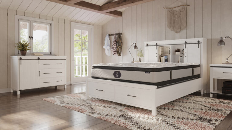Elite Luxe mattress on a bed frame in a finished room