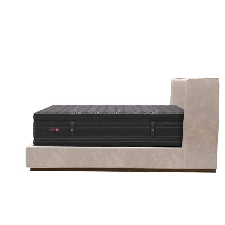 Side view of a Fuchsia Duo mattress on a bed frame